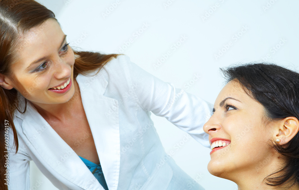 portrait of two young woman on white back portrait of two young woman on white back