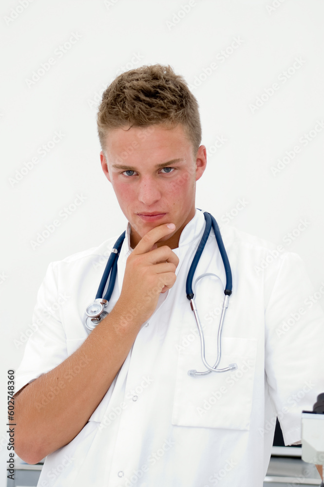 young doctor or student looking serious at you young doctor or student looking serious at you