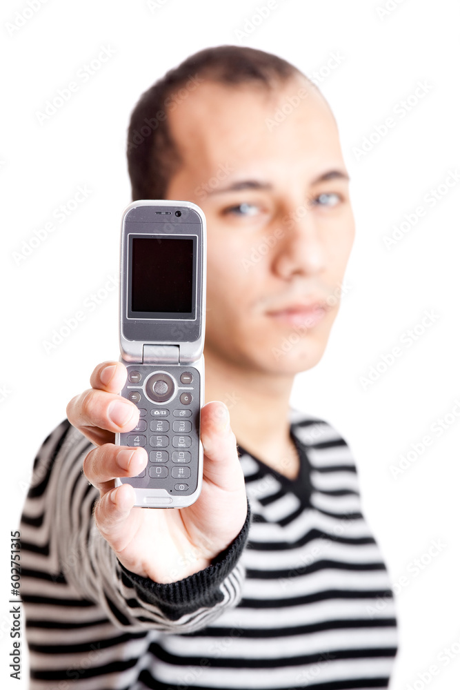 Young man portrait holding a cellphone isolated on white Young man portrait holding a cellphone isolated on white