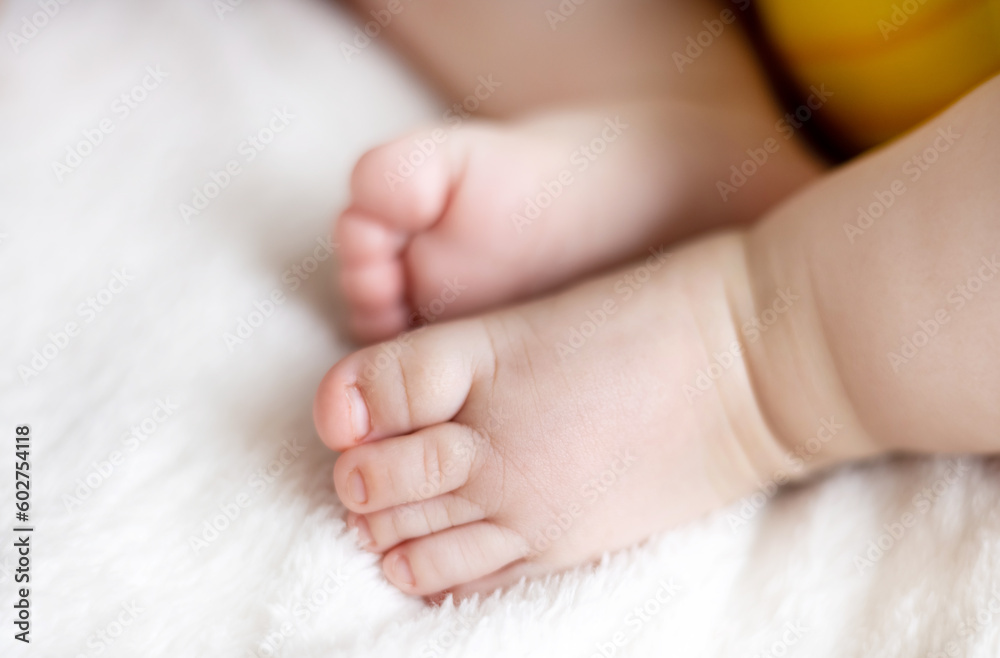 adorable cute baby boy infant toddler sleeping on bed blanket close up face parts small fat little hands,legs feet,barefoot child.new born in yellow bodysuit sweet dreams cute maternity big cheeks adorable cute baby boy infant toddler sleeping on bed blanket close up face parts small fat little hands,legs feet,barefoot child.new born in yellow bodysuit sweet dreams cute maternity big cheeks