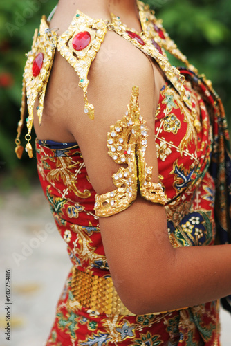 Close-up of a Thai female in bright traditional dress