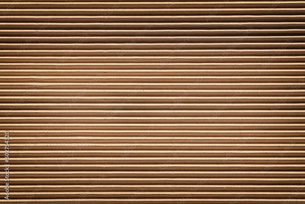 Horizontal corrugated brown cardboard texture, background. Horizontal corrugated brown cardboard texture, background.