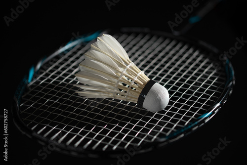 Badminton shuttlecock and racket. Goose feather shuttlecocks. High Speed Badminton Birdies. Great Stability and Durability. Professional sport equipment. Game. High resolution photo