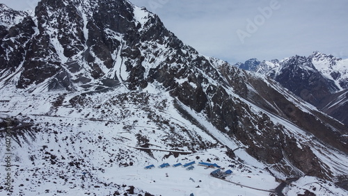 snow covered mountains near the farellones park in Chile photo