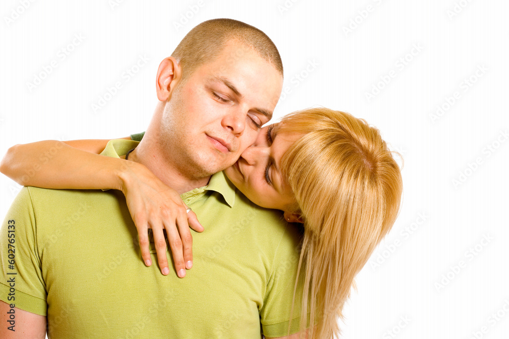 Beautiful blond woman portrait close up kissing man Beautiful blond woman portrait close up kissing man