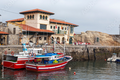 nice fishing port in the spanish town of comillas, cantabria. photo