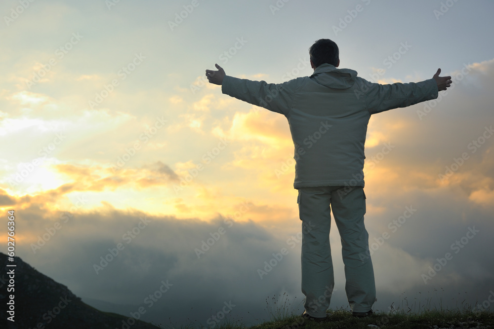 healthy young man practice youga in height mountain at early morning and sunrise healthy young man practice youga in height mountain at early morning and sunrise