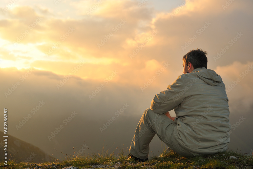 healthy young man practice youga in height mountain at early morning and sunrise healthy young man practice youga in height mountain at early morning and sunrise