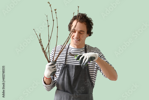 Male gardener with secateur...