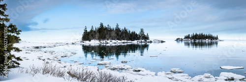 Beautiful winter panorama along the shores of the St. Lawrence River during winter