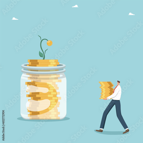Man carries money to a jar of coinsInvestment portfolio, own money management, capital investments or deposit boxes, financial growth, increase in income and profitability of stocks and investments, m