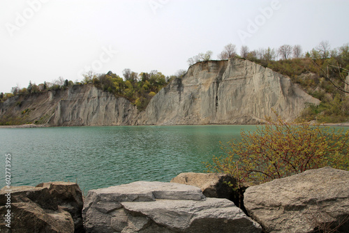 Obraz na plátně Spring landscape with lake and bluffs