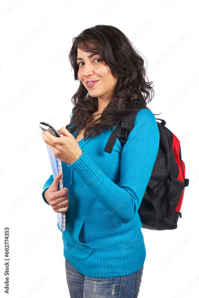 Young student woman with notebook sending sms with cell phone over a white background Young student woman with notebook sending sms with cell phone over a white background