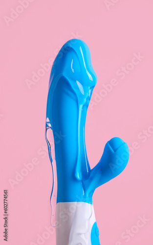 Принти на полотні Vibrator with lubricant on pink background