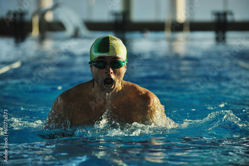 health and fitness lifestyle concept with young athlete swimmer recreating on olimpic pool