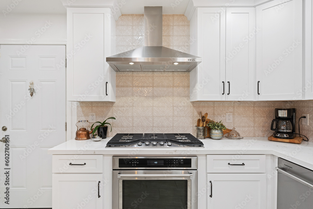 encaustic tiled backslash behind an oven area and cabinets encaustic tiled backslash behind an oven area and cabinets