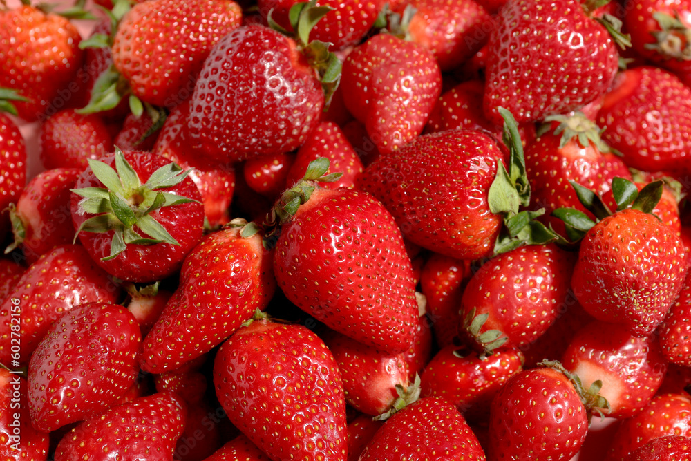Texture of fresh strawberries as background Texture of fresh strawberries as background