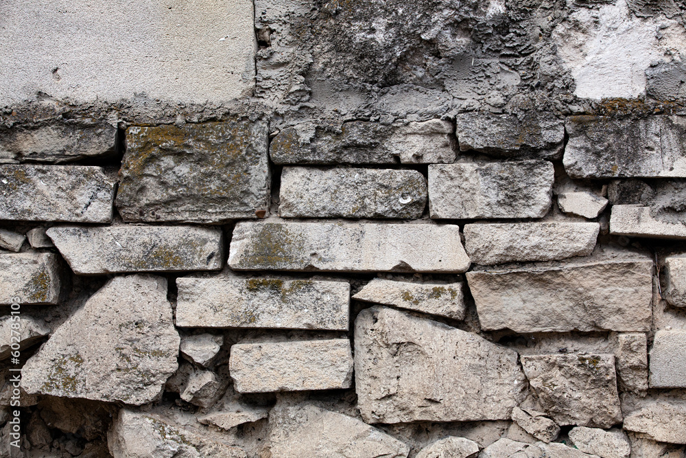 Old stone wall. Old construction or architectural background.