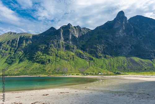 The crystal clear water of the Ersfjordstranda beach in Senja Island, Norway
