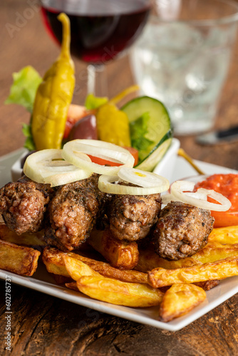 cevapcici with french fries photo