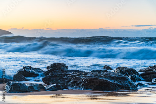 Sunrise and Waves - Surf's up at the seaside