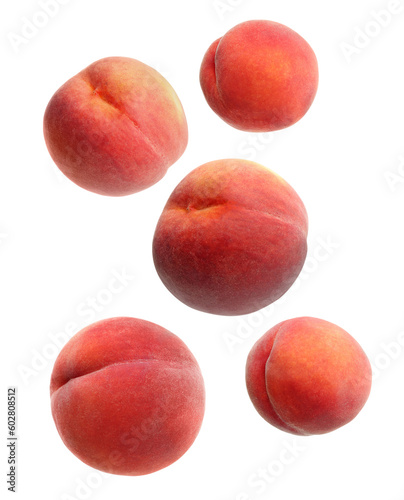 Fresh ripe peaches falling on white background