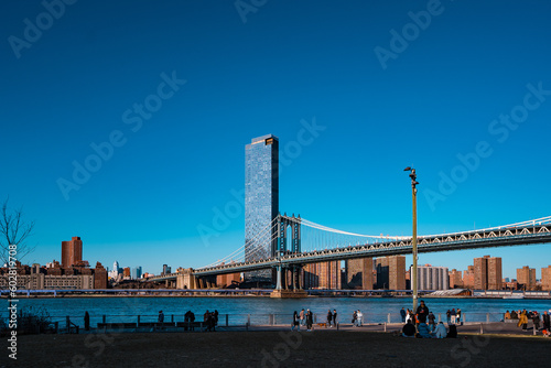 Manhattan Bridge, New York City, in a sunny day, clear blue sky