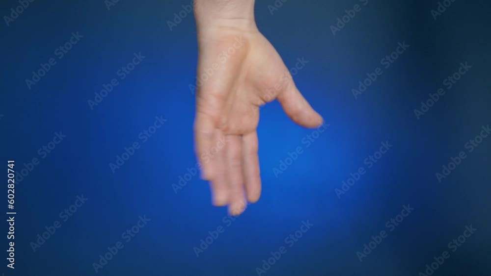 Shake left hand to stimulate blood stream or release pain after brutal workout