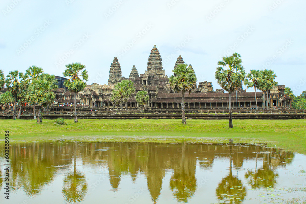 Angkor Wat temple reflecting in water of Lotus pond. Siem Reap. Cambodia. Panorama, copy space for text