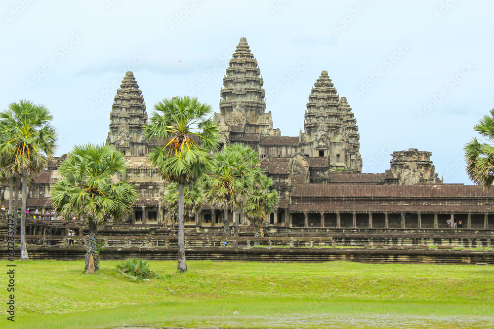 Large Towers At Angkor Wat Temple Complex. Angkor Wat Is A Temple Complex In Cambodia And Is The Largest Religious Monument In The World.