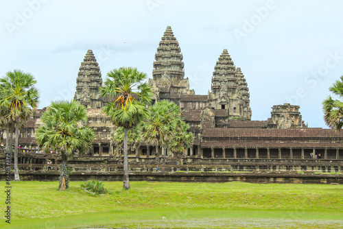 Large Towers At Angkor Wat Temple Complex. Angkor Wat Is A Temple Complex In Cambodia And Is The Largest Religious Monument In The World.