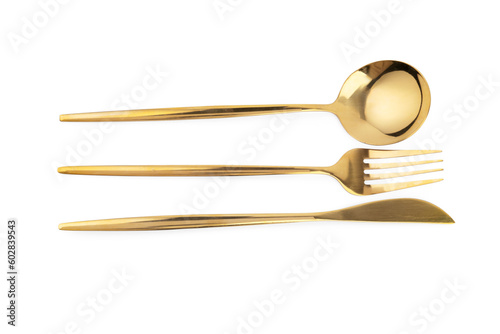Golden cutlery on white background