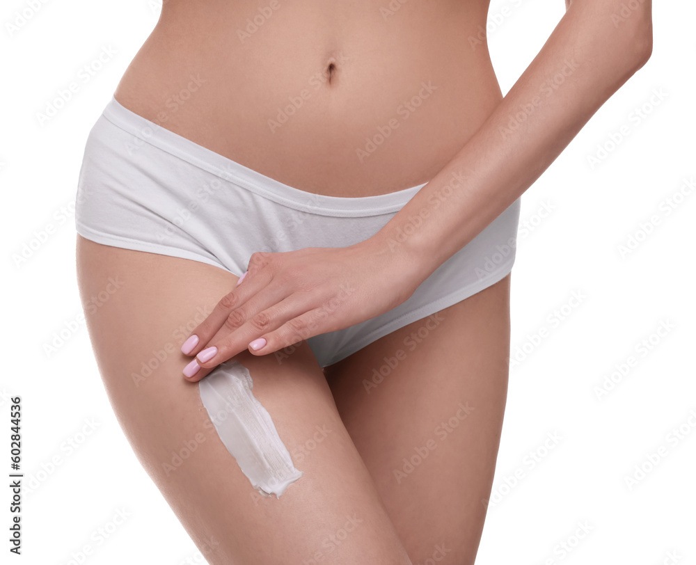 Woman with smear of body cream on her leg against white background, closeup