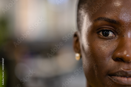 Closeup portrait of african american female architect looking at camera confidently, copy space
