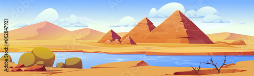 Desert river landscape with yellow sand  stone egyptian pyramides vector cartoon scenic background. Oasis with lake water in dry african Sahara  cracked ground with dusty green plants  sunny blue sky