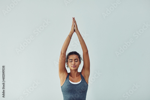 Yoga, meditation and woman on a white background for wellness, breathing exercise and healthy body. Fitness, zen mockup and female person meditate for calm, peace and relax for balance and wellbeing