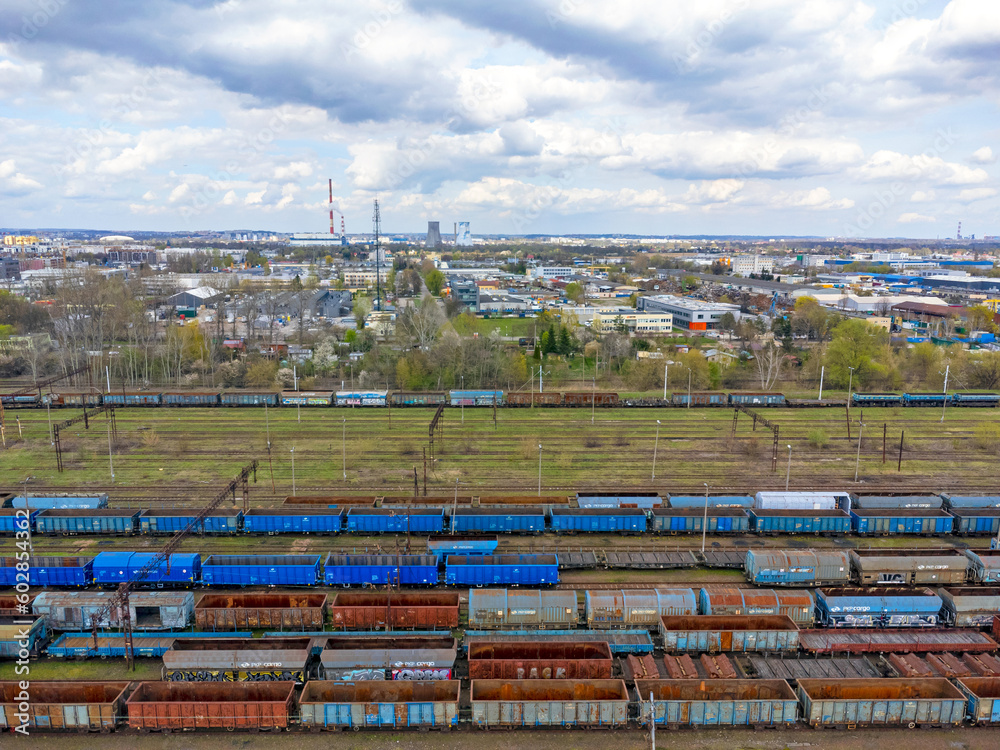 Aerial view landscape. View of old trains, depot, railroad tracks, cargo.