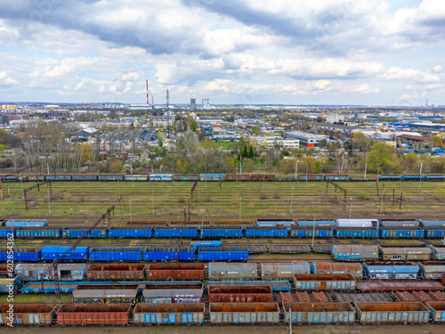 Obraz na płótnie Aerial view landscape. View of old trains, depot, railroad tracks, cargo. w salonie
