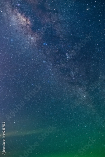 View universe space shot of milky way galaxy with stars on a night sky background.The Milky Way is the galaxy that contains our Solar System. © yzhensiang