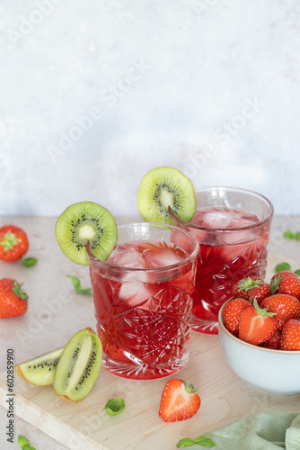 2 glasses of iced tea with fresh fruit photo