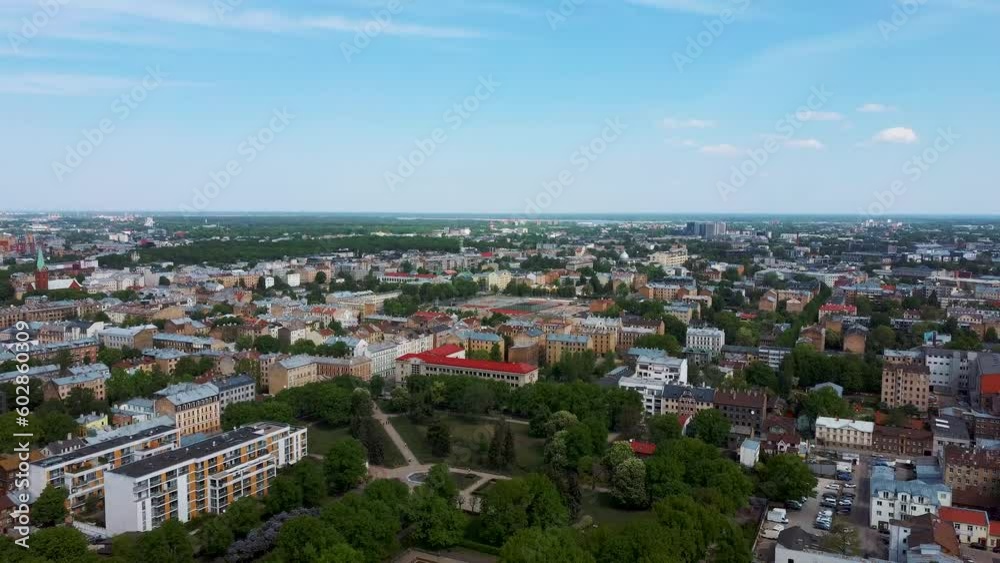 Riga Cityscape Spring Aerial Top View Video, Town, Latvia. Sunny Day Building Rooftops. Riga Skyline, Latvia, City Center, Ziedondarzs Park. City Center, Teika, Purvciems in the Background. Riga Cityscape Spring Aerial Top View Video, Town, Latvia. Sunny Day Building Rooftops. Riga Skyline, Latvia, City Center, Ziedondarzs Park. City Center, Teika, Purvciems in the Background.