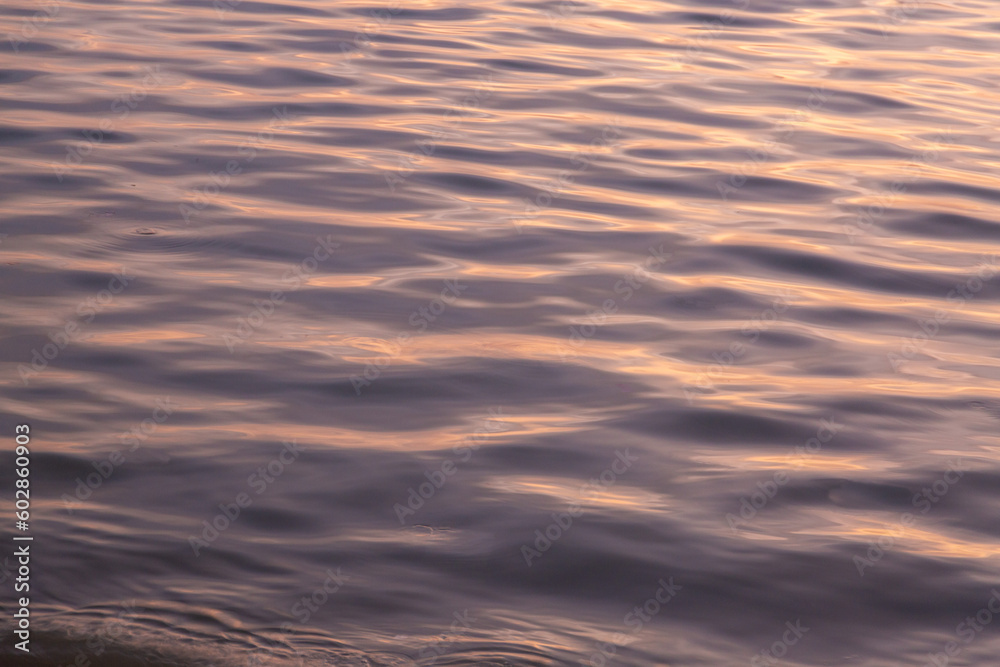 Abstract seawater reflection during sunrise and sunset moment. Colourful water reflection. Contented Emotion