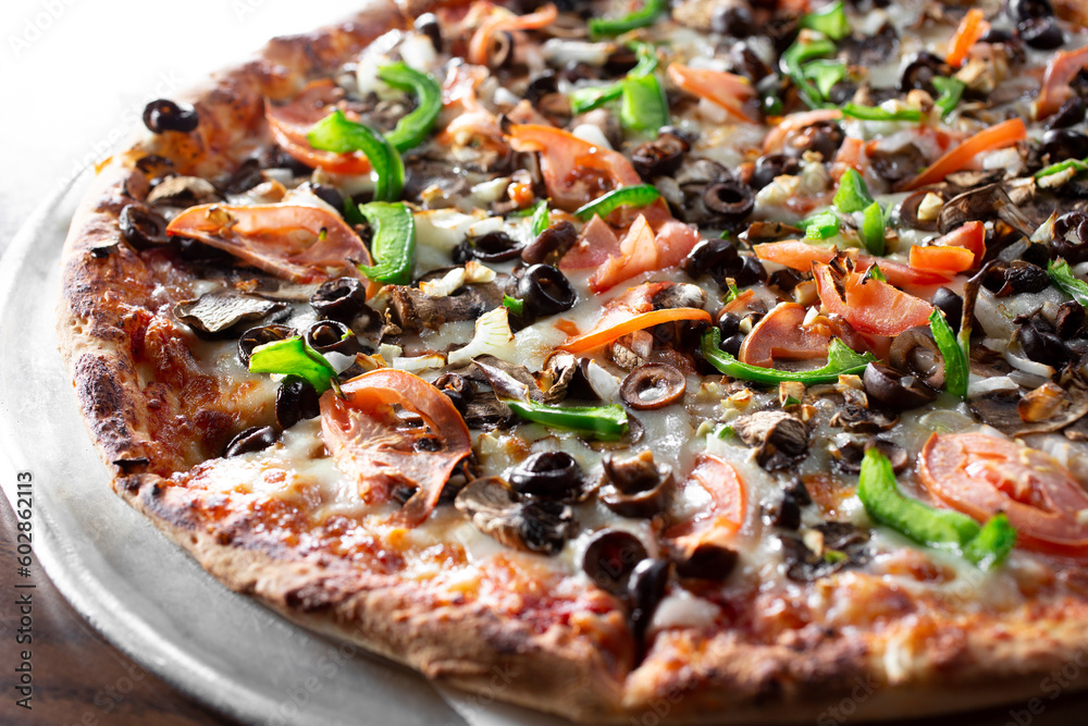 A view of a veggie pizza. A view of a veggie pizza.
