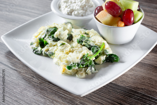 A view of an egg white scramble, featuring spinach.