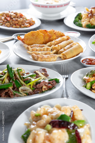 A view of several Chinese entrees.