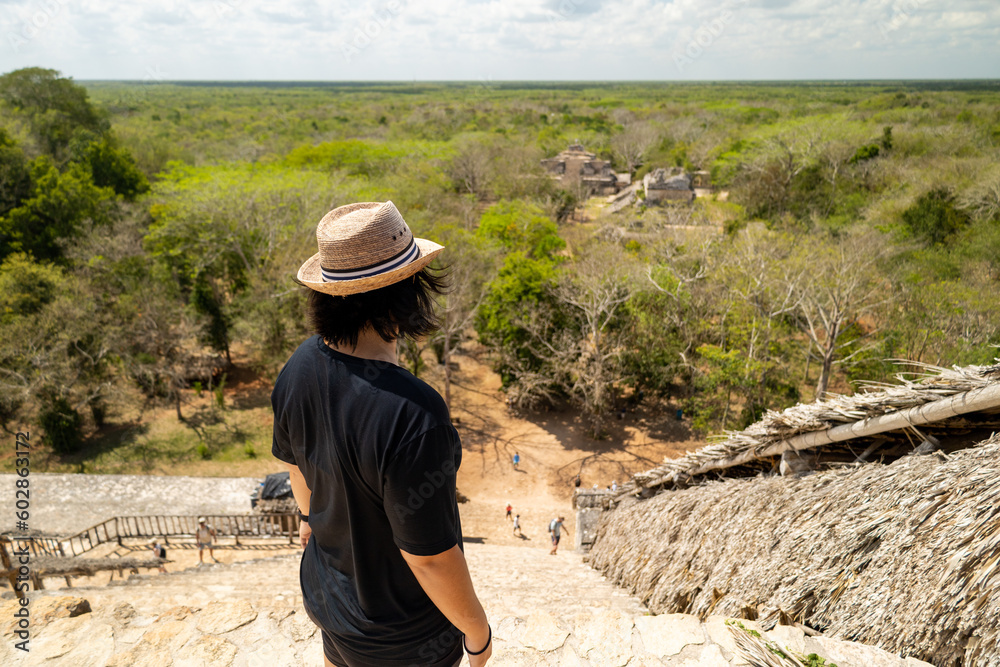 A girl in the top Acropolis in ancient city of Maya Ek Balam