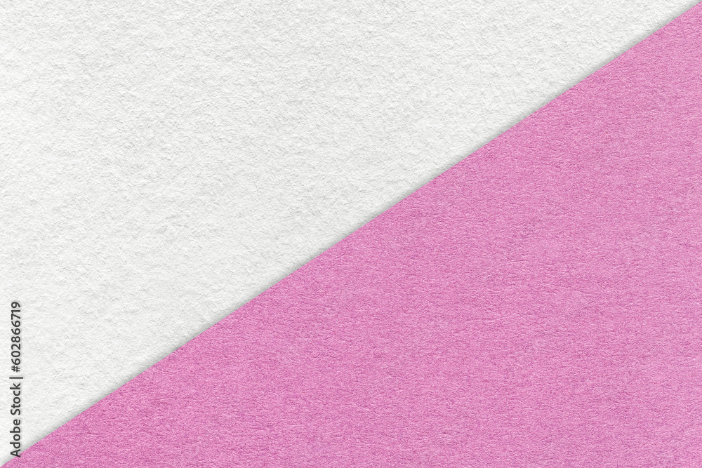 Texture of craft white and lilac paper background, half two colors, macro. Vintage dense kraft pink cardboard. Texture of craft white and lilac paper background, half two colors, macro. Vintage dense kraft pink cardboard.