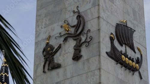 Batumi, Georgia – May 6, 2023: Column decorations of Statue of Medea erected in Batumi, Georgia. Fragments from the myth that tells about the journey of the Argonauts for the Golden Fleece.