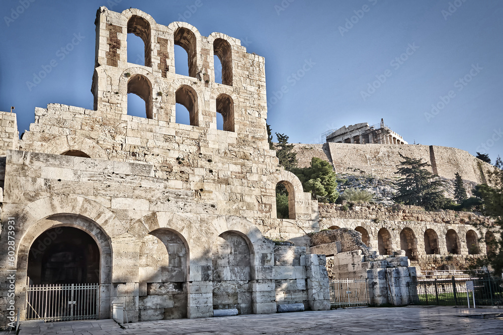 The entrance and arches of the ancient conservatory of Herod Atticus at the foot of the Acropolis. Cultural travel in Athens, Greece.