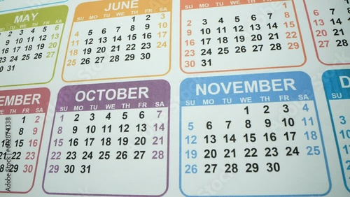 Calendar month macro. Many dates with holidays and businessdays. December, November, October, May, Janyary 2023. Halloween, Christmas Happy new year. New possibilities concept. Fast, And New Days Are photo